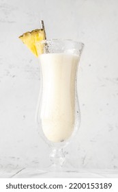 Chi Chi Organico Cocktail Garnished With Pineapple Wedge