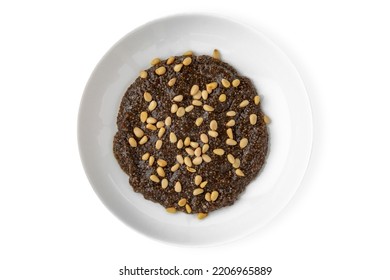 Chia With Pine Nuts. Balanced, Nutritious, Tasty And Nutritious Food. Ready-made Menu For A Restaurant Or For Delivery. Dish In A White Plate Isolated On A White Background.