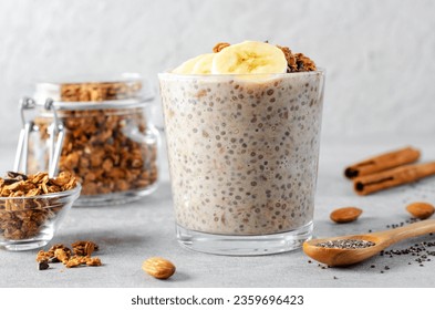 Chia Pudding with Banana, Granola and Cinnamon, Overnight Banana Oats, Healthy Breakfast or Snack, Parfait, Vegetarian Food - Powered by Shutterstock