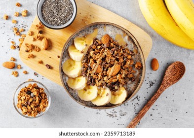 Chia Pudding Bowl with Banana, Granola and Cinnamon, Healthy Breakfast or Snack, Vegetarian Food - Powered by Shutterstock