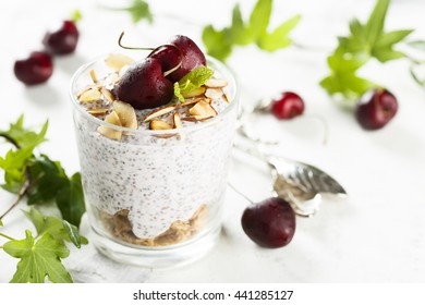 Chia pudding with sour cherry and almond flakes