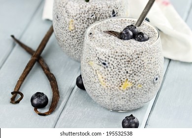 Chia seed pudding made with mangoes and blueberries with extreme shallow depth of field. - Shutterstock ID 195532538