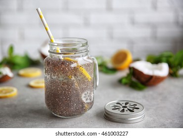 Chia Seeds Drink With Lemon And Mint In Glass Jar On Table