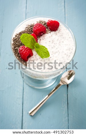 Similar – Chia-Joghurt mit Himbeeren im Glasbecher