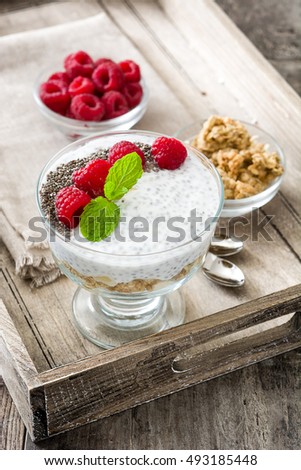 Similar – Chia-Joghurt mit Himbeeren im Glasbecher