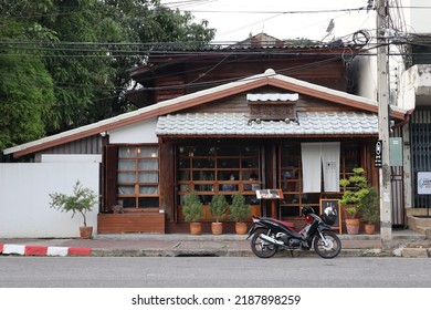 Chiang Mai, Thailand - 20 April 2022: Lovely Wooden Traditional Japanese Tea House Exterior Cute Cosy Café With Motorbike Parked In Front