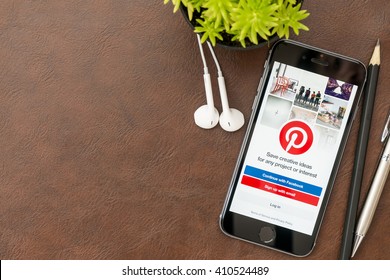 CHIANG MAI, THAILAND - Apr 23,2016: Apple IPhone With Pinterest Application On The Screen. Pinterest Is An Online Pinboard That Allows People To Pin Their Interesting Things.