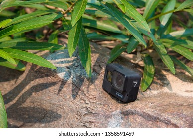 Chiang Mai / Thailand - April 03 2019: Camera Go Pro Hero 7 black in nature lies on the rocks.