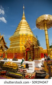 Chiang Mai, Thailand - April 6, 2015 - golden pagoda in twilight of wat phra that doi suthep.