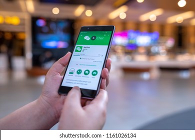 CHIANG MAI, THAILAND - August 03,2018: Woman Hands Holding HUAWEI With WeChat  On The Screen.WeChat Is A Chinese Multi-purpose Messaging, Social Media And Mobile Payment App Developed By Tencent.