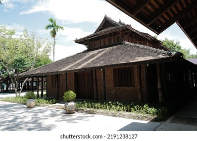 CHIANG MAI, THAILAND- AUGUST 18, 2022: Exterior Northern Thai Architecture And Lanna Building Design Of Old Traditional House With Natural Green Terrace And Patio