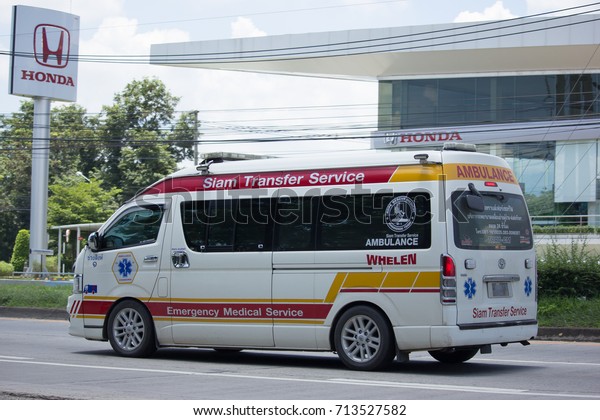 CHIANG MAI, THAILAND - AUGUST 28  2017:   Ambulance\
van of Siam Tranfer Service. On road no.1001, 8 km from Chiangmai\
Business Area.
