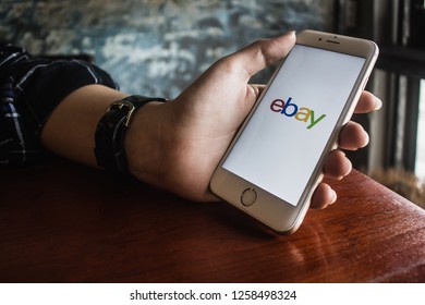 CHIANG MAI, THAILAND - DEC 16,2018: Woman hands holding iPhone 6s with eBay apps on the screen. eBay is one of the most popular ways to buy and sell goods and services on the internet.