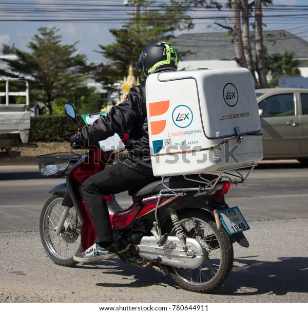 CHIANG MAI, THAILAND -DECEMBER 12\
2017: Lazada Express and Logistics Mini Container Motorcycle. Photo\
at road no 121 about 8 km from downtown Chiangmai,\
thailand.