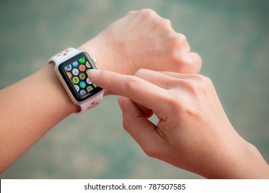 Chiang Mai, Thailand - December 7, 2017: Woman Wearing Apple Watch. Multiple Apps View.