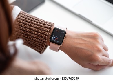 CHIANG MAI ,THAILAND FEB 24, 2019 : Woman hand with Apple Watch Series 3 with Heart Rate on the screen. Apple Watch was created and developed by the Apple inc.