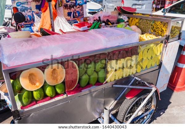 Chiang\
Mai , Thailand - January, 18, 2020 : Mobile fruit truck. Street\
fruit truck in Thailand at Chiang Mai ,\
Thailand