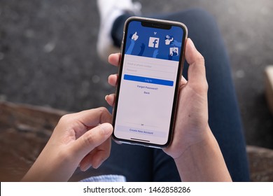 CHIANG MAI, THAILAND - JUL 16, 2019: Facebook Social Media App Logo On Log-in, Sign-up Registration Page On Mobile App Screen On IPhone X (10) In Person's Hand Working On E-commerce Shopping Business