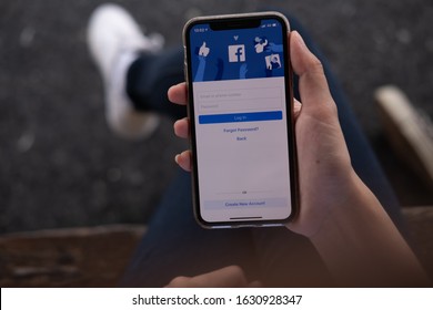 CHIANG MAI, THAILAND - JUL 16, 2019: Facebook Social Media App Logo On Log-in, Sign-up Registration Page On Mobile App Screen On IPhone X (10) In Person's Hand Working On E-commerce Shopping Business
