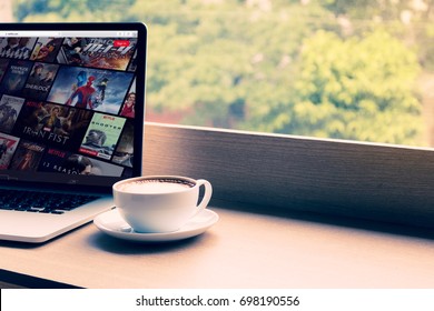 CHIANG MAI ,THAILAND - July 5, 2017 : Netflix Website Showing On Screen Laptop With Macbook Pro At Cafe. Netflix Being Popular Internationally