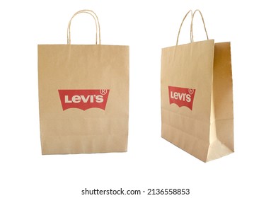 .Chiang Mai, Thailand, March 4, 2022. Brown Paper Shopping Bagswith Levi´s Logo Isolated On White Background.