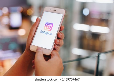 CHIANG MAI, THAILAND - May.10,2019: Woman holding iPhone with Instagram application on the screen. Instagram is a popular online social networking service. - Shutterstock ID 1439709467