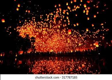 CHIANG MAI, THAILAND - NOVEMBER 8, 2014: People release Khom Loi, the sky lanterns during Yi Peng or Loi Krathong festival on November 8, 2014 in Mae Jo University, Chiang Mai, Thailand.