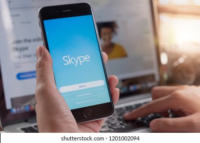 CHIANG MAI, THAILAND - Oct 12 ,2018: Woman holding iphone 6s with skype apps. Skype is part of Microsoft, can make video, audio calls, chat messages and do much more using Skype.