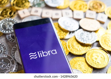 CHIANG MAI,THAILAND - JUNE 6,2019: Libra coin facebook coins on mobile phone screen Virtual electronic money concept.