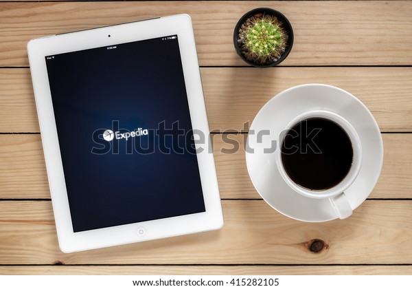 CHIANG\
MAI,THAILAND - May 3,2016 : IPad 4 open Expedia application.Expedia\
is an online travel company initially launched in October 22, 1996\
as the first Microsoft internet\
property.