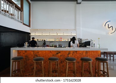 CHIANG MAI,THAILAND-MAY 22,2020:Selective Focus Of Interior Counter Bar Design And Decoration At 'TWO' Coffee Cafe And Bakery Shop Decorated With Brick Tiles, Wooden Antique Furniture And White Wall