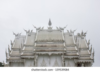 CHIANG RAI - OCTOBER 17: Wat Rong Khun On OCTOBER 17, 2013 In Chiang Rai, Wat Rong Khun Is A Contemporary Unconventional Temple In Chiang Rai, Thailand. It Was Designed By Chalermchai Kositpipat