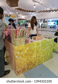 CHIANG RAI, THAILAND - JANUARY 2 : Unidentified Asian Woman Wrapping Gift In Supermarket On January 2, 2019 In Chiang Rai, Thailand.