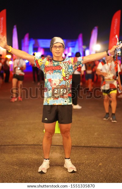 Chiang Rai THAILAND-11:2:2019:Night Run Half\
Marathon 2019 | PARTNER in Chiang Rai Thailand.People. Running at\
city. Street