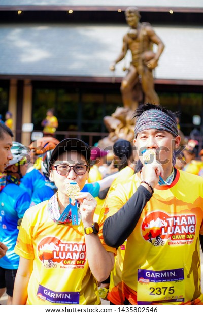 Chiang Rai THAILAND-6:15: 2019:Tham Luang cave\
day bike&run 2019 IN Chiang Rai THAILAND .People. Running at\
city. Streets.