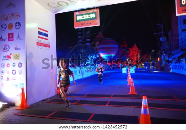 Chiang Rai\
THAILAND-6:8: 2019: CHIANG RAI NIGHT RUN LIGHTING IN THE CITY\
2019.People. Running at city. Streets\
-