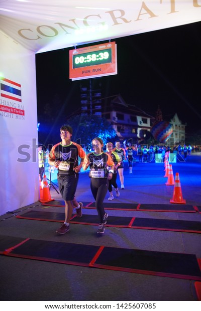 Chiang Rai\
THAILAND-6:8: 2019: CHIANG RAI NIGHT RUN LIGHTING IN THE CITY\
2019.People. Running at city. Streets\
