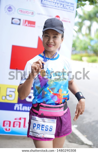 Chiang Rai THAILAND-8: 11: 2019: 111-year-old\
high school SWK MINIMARATHON 2019 IN Chiang Rai THAILAND .People.\
Running at city.\
Streets.