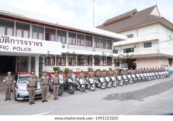 Chiang Rai THAILAND-8:\
30: 2019: Uniform Police posed in front of police station in Chiang\
Rai Thailand.