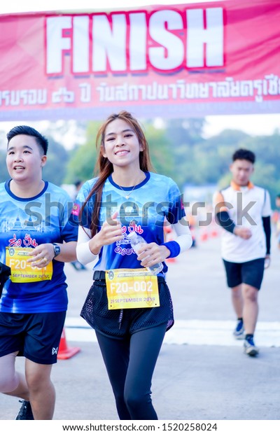 Chiang Rai THAILAND-9:29:2019: Walking, running,\
biking, healthy 46-year anniversary of the Establishment of\
Teachers College Rai CRRU. in Chiang Rai Thailand.People. Running\
at city. Street.