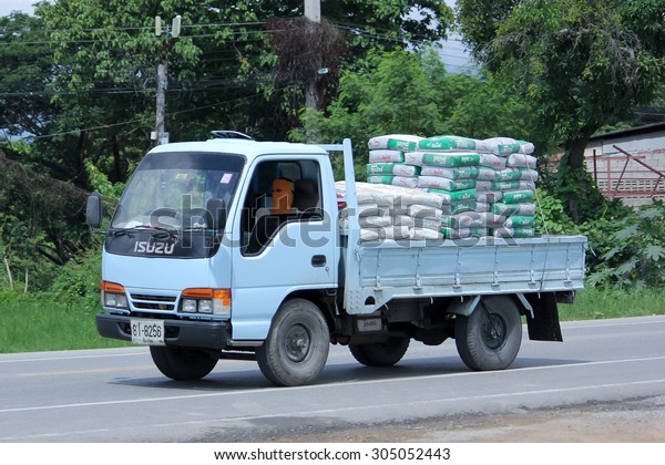 CHIANGMAI, THAILAND -AUGUST 8 2015: Cement\
truck of Insee Cement company. Photo at road no 121 about 8 km from\
downtown Chiangmai,\
thailand.