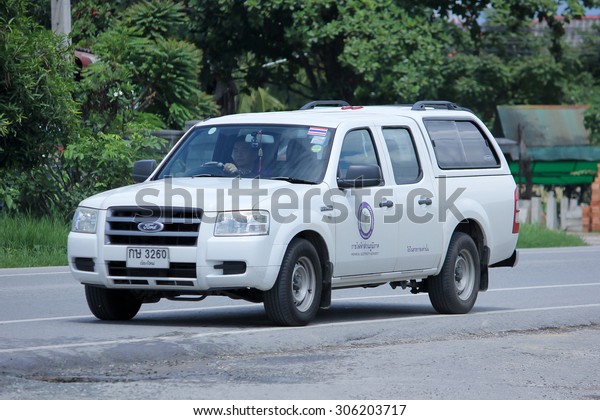 CHIANGMAI, THAILAND\
-AUGUST 8 2015:  Pick up truck car of Provincial eletricity\
Authority of Thailands. Photo at road no.1001 about 8 km from\
downtown Chiangmai,\
thailand.