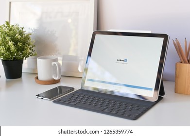 CHIANGMAI, THAILAND - DEC 23, 2018 : iPad Pro12.9 tablet new product of apple using Linkedin application, Linkedin is a social networking service for business people. Editorial. - Image.