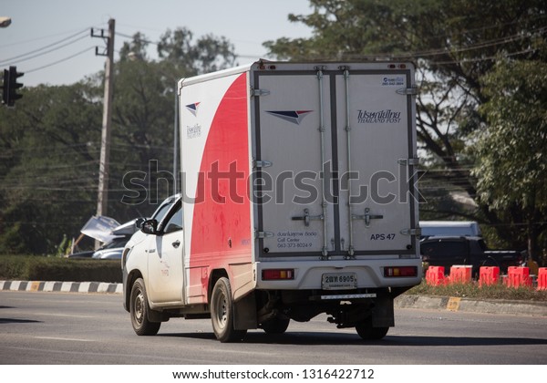 Chiangmai, Thailand - February 4 2019: Truck of\
Thailand Post. Photo at road no.121 about 8 km from downtown\
Chiangmai, thailand.