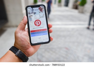 CHIANGMAI, THAILAND - JAN 08,2018 :Brand new Apple iphone X with social Internet service Pinterest on the screen. iPhoneX was created and developed by the Apple inc.