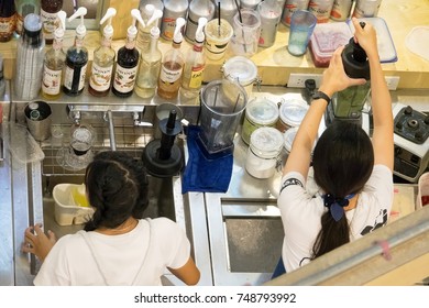 Chiangmai, Thailand - July 8, 2017: A Part Time Young Student Working At Coffee Shop On School Holiday.