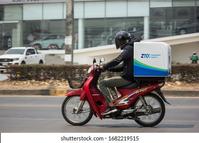 Chiangmai, Thailand - March  24 2020: ZTO Express and Logistics Mini Container Motorcycle. Photo at road no 121 about 8 km from downtown Chiangmai, thailand.