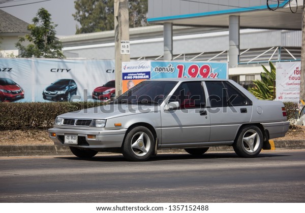 Chiangmai, Thailand - March 8 2019:  Private\
car, Mitsubishi Lancer Champ. Photo at road no 121 about 8 km from\
downtown Chiangmai,\
thailand.