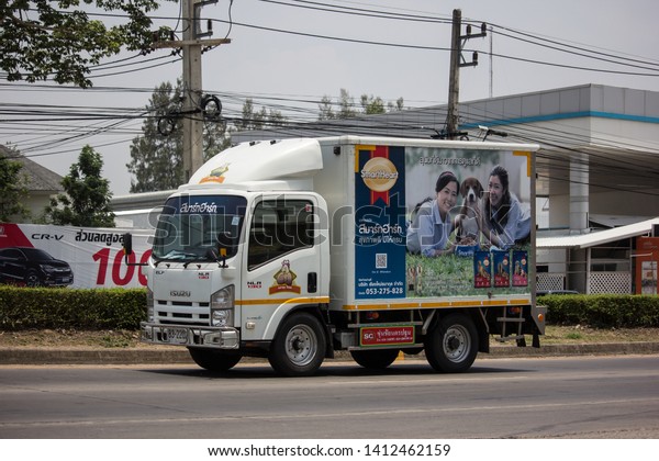 Chiangmai, Thailand - May 21 2019:\
Container Truck for Cat food Transportation. Photo at road no.121\
about 8 km from downtown Chiangmai,\
thailand.