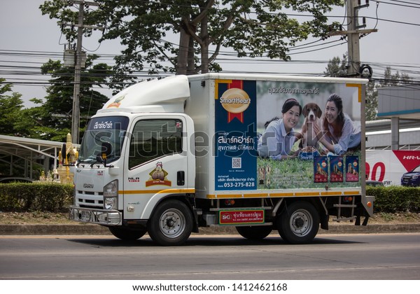 Chiangmai, Thailand - May 21 2019:\
Container Truck for Cat food Transportation. Photo at road no.121\
about 8 km from downtown Chiangmai,\
thailand.